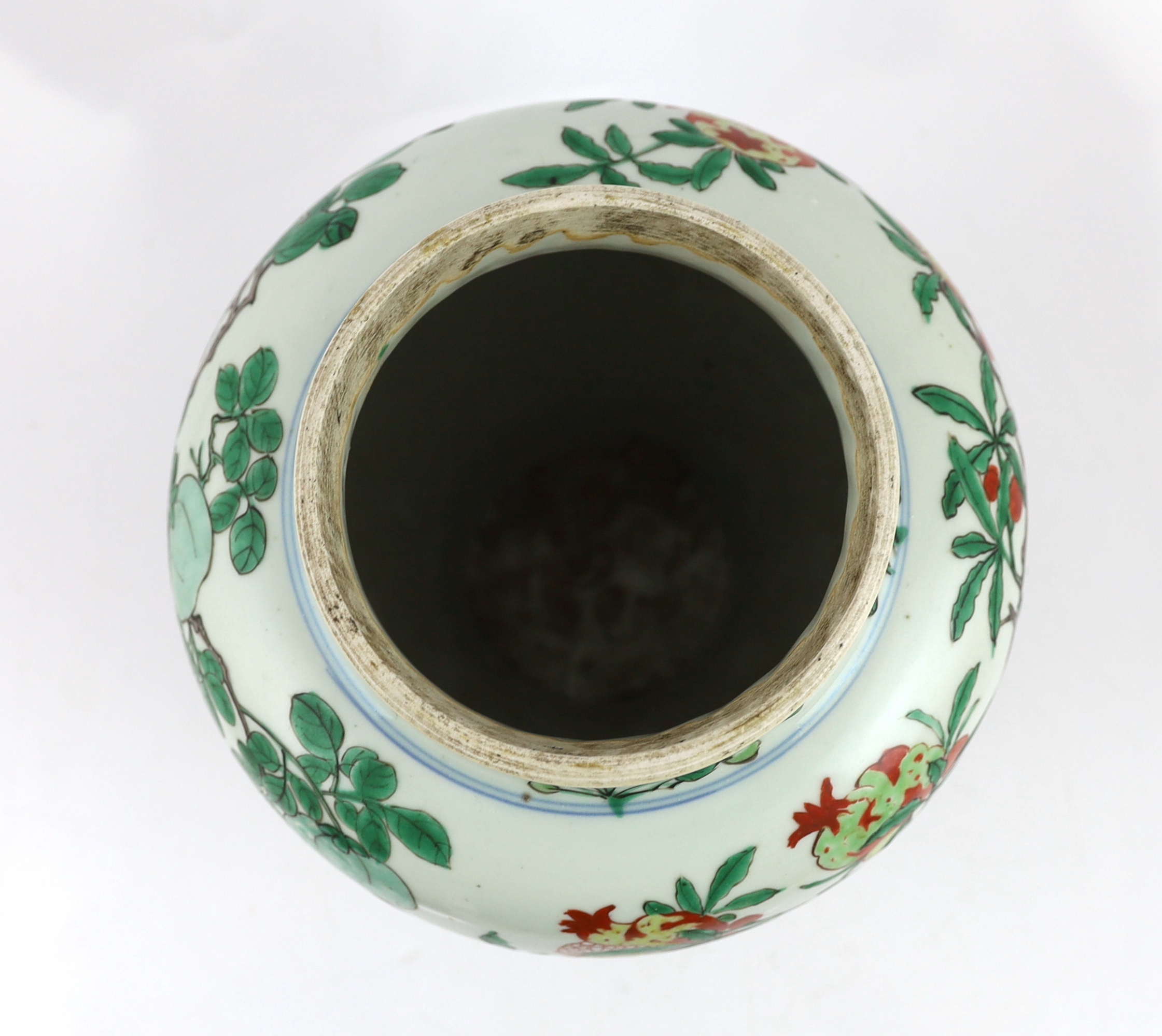 A Chinese wucai ‘pomegranate’ baluster vase, Transitional, Shunzhi period, c.1650